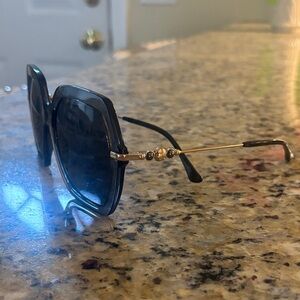Elegant Black and Gold Sunglasses